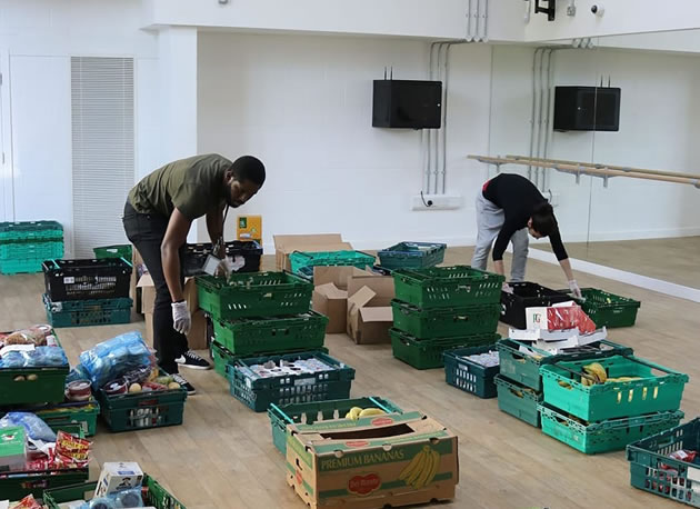 Sorting donations at Acton Gardens Community Centre