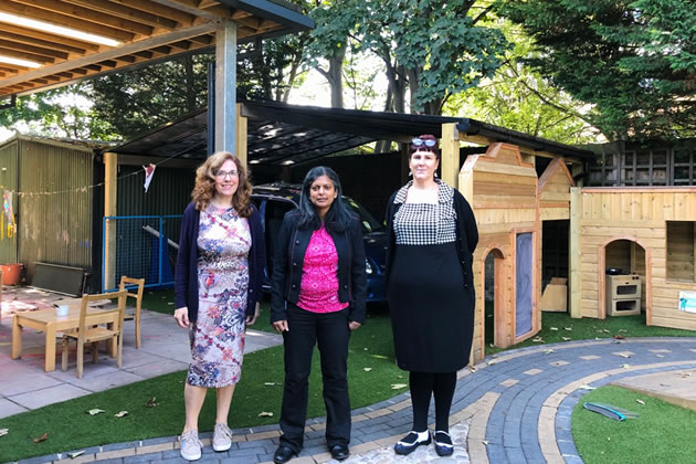 Rupa Huq MP (centre) with staff on a visit after the flooding