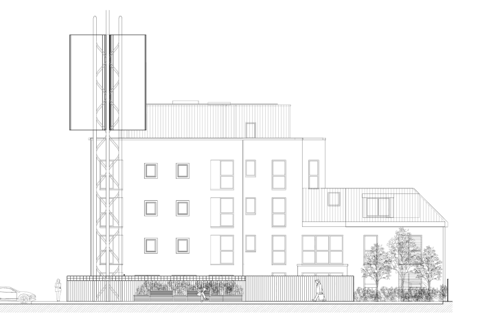 The illuminated sign will be positioned above the nearby flats 