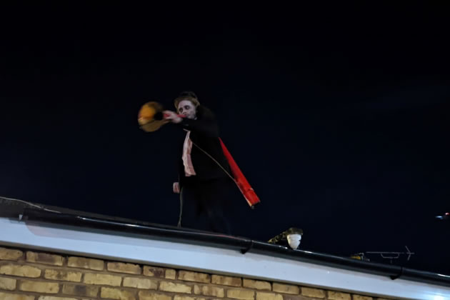 A zombie on a roof