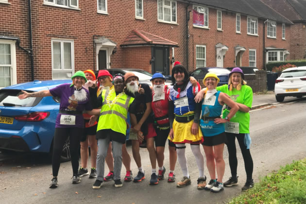 Volunteers with runners at a previous EalingHalf Marathon