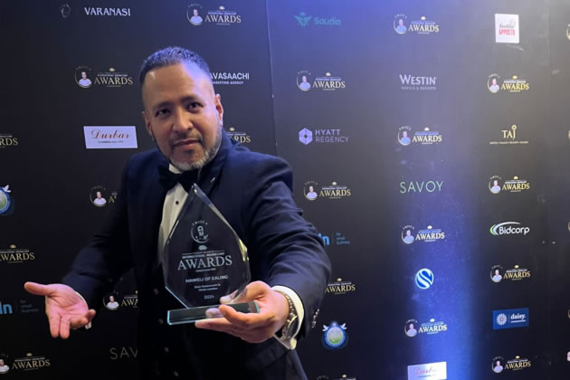 Manik shows off the award for Haweli