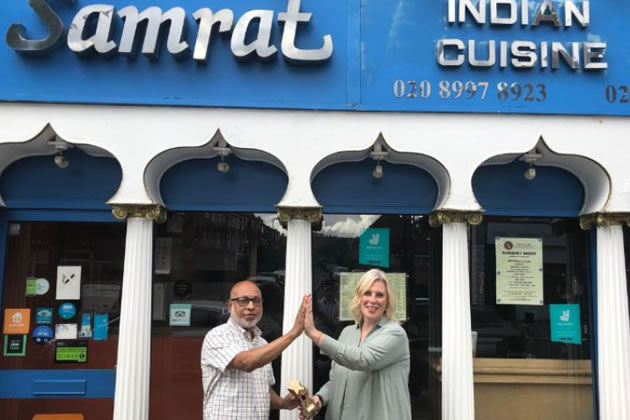 Samrat's owner celebrates improved hygiene rating with Cllr Louise Brett
