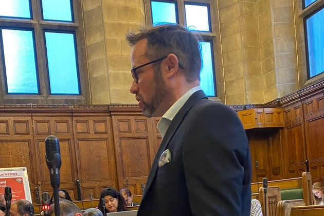 Cllr Gary Malcolm addresses a question to the council
