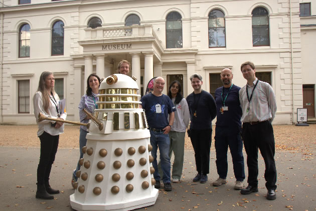 Museum staff with a dalek in front of Gunnersbury Park Museum