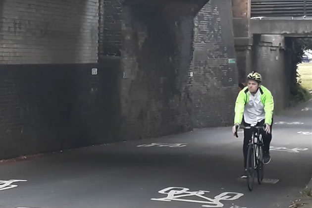 Council leader Peter Mason riding his bike