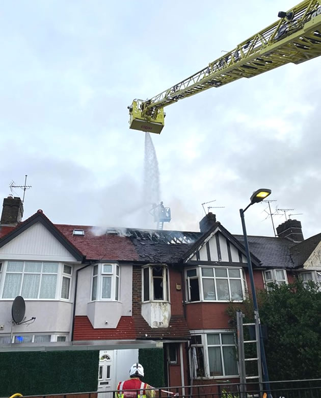 Firefighters tackle the fire on Western Avenue